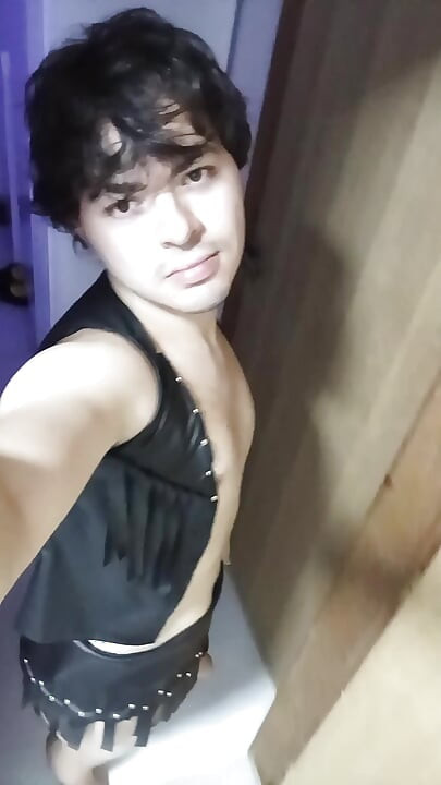 mean gay princess wearing cowboy latex leather skirt