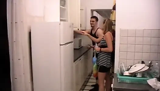 Poor Dude Must Clean Kitchen on Order of His Mistress