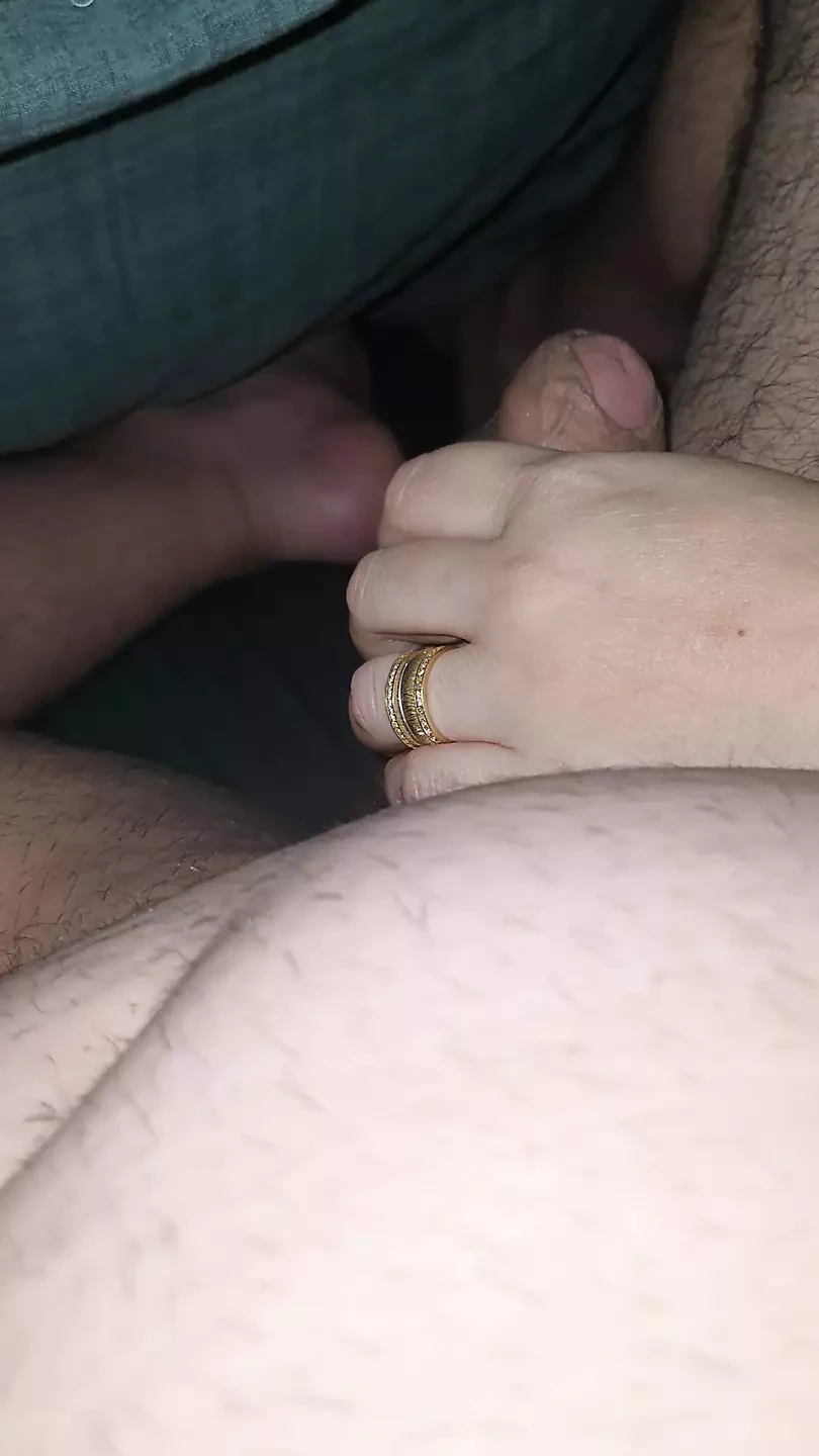 Step mom under blanket touching step son dick and handjob his cock
