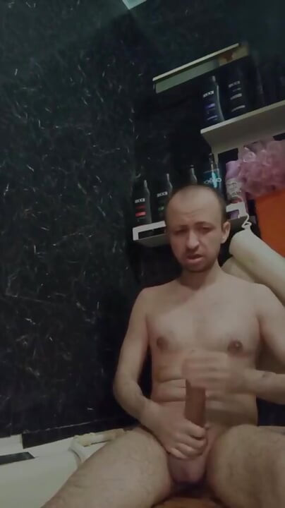 A Naked Man Jerks off His Big Dick in the Bathroom