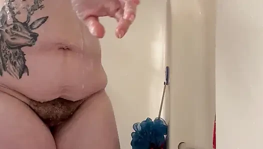 Tattooed milf soapy shower playing with pussy