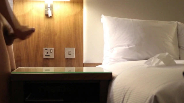 Cumming all over a hotel room table