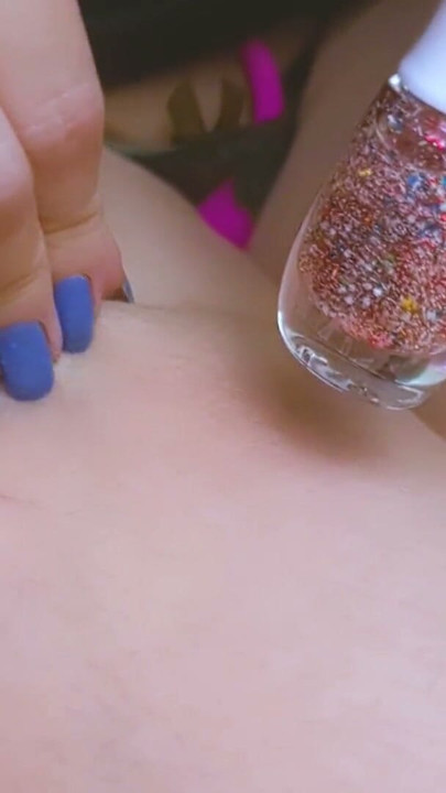 Teen with beautiful nails and legs is painting her nails while masturbate | Clip 1