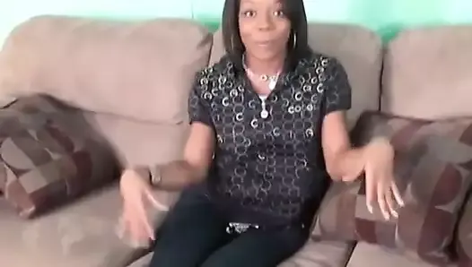 Sexy slim black girl rubs her wet pussy on the couch
