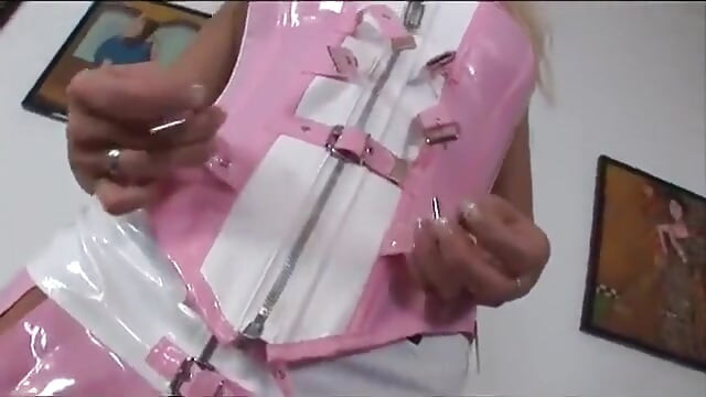 This is a real huge rubber cock that she puts on her tight pussy