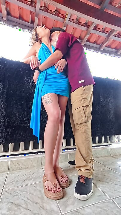 Playing secretly on the balcony during a boring party.