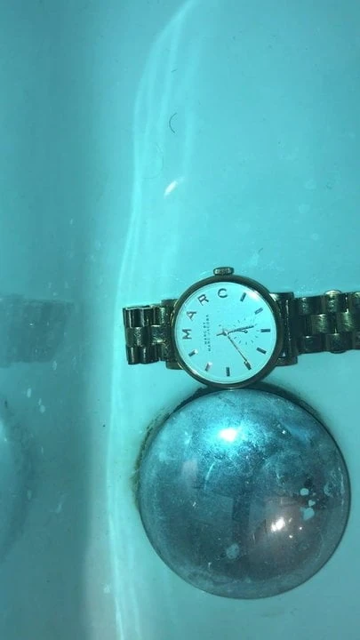 Messing up a collegues watch