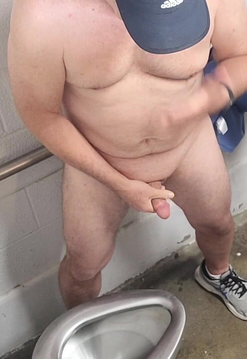 Swallowing my own cum in public men's room