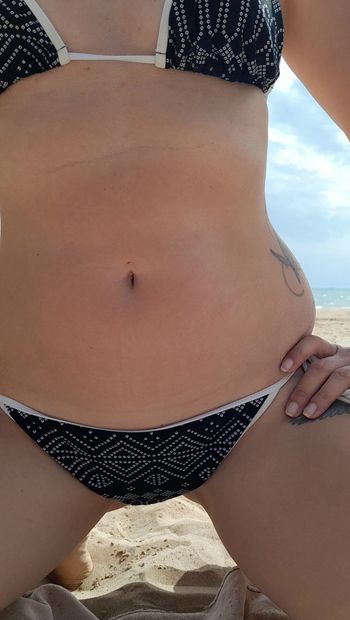 I'm showing off my new sexy bikini at the beach. My boyfriend was very horny after her made the pictures so he deciced to fuck me on the beach. Watch the movie now