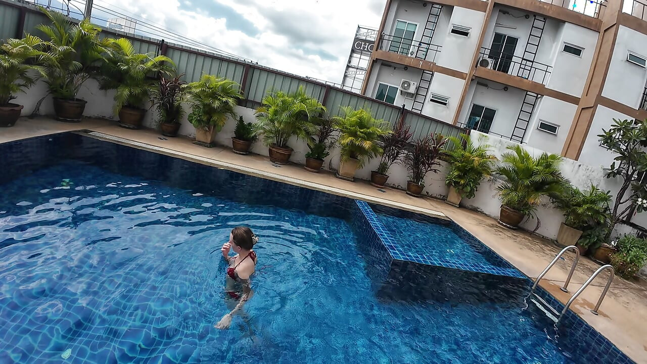 watch us playing in our swimming pool