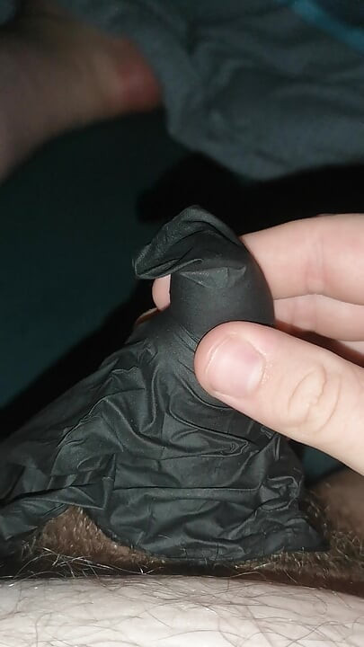 Cumming into a latex glove