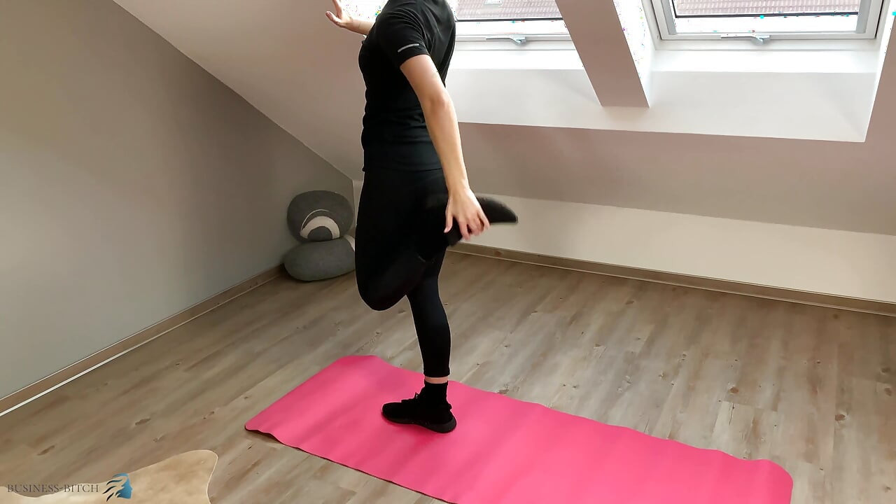Business woman trains in gym to stay fit
