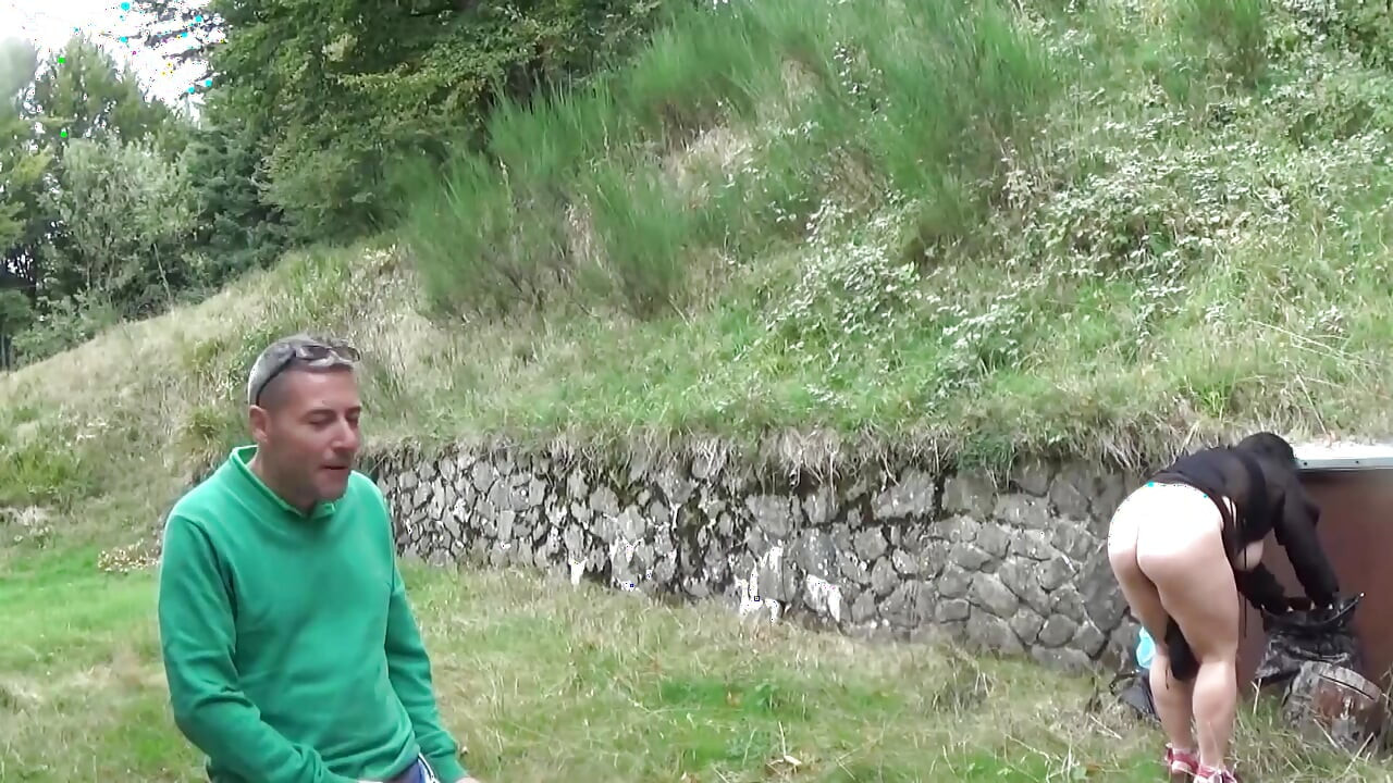 Fucking  a big boob lady on the grass