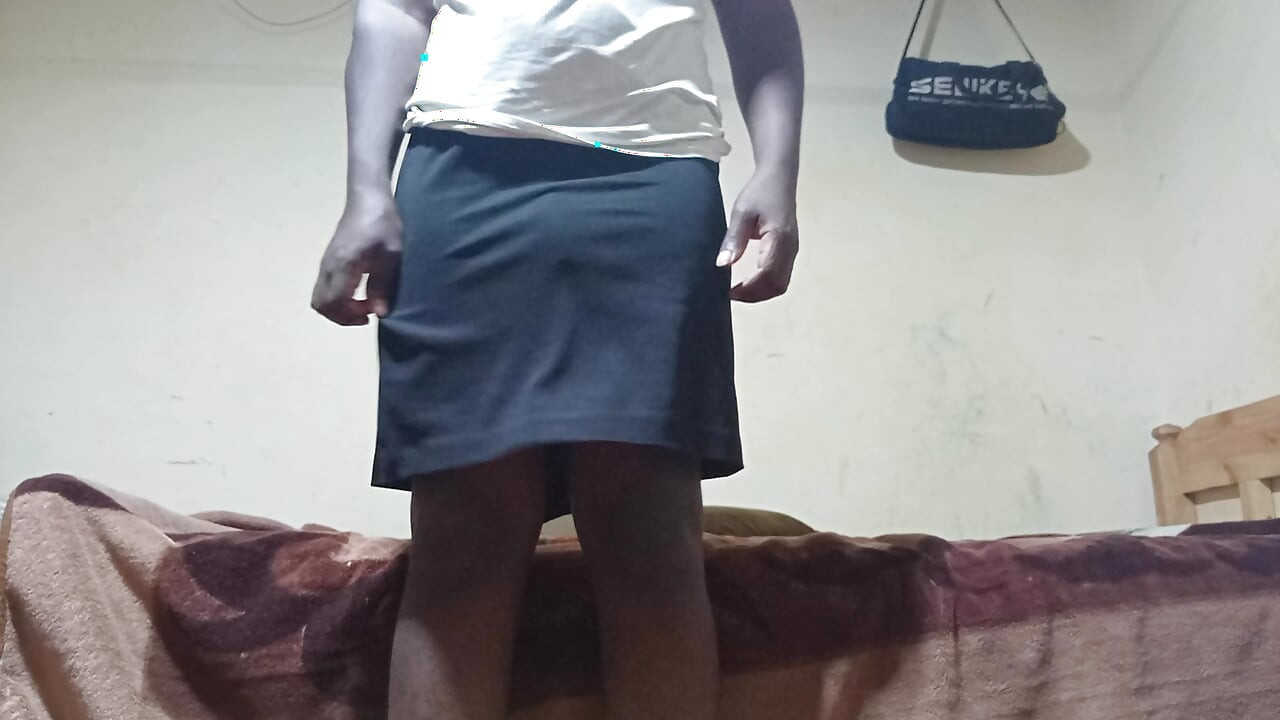 Sexy African shemale spreading her ass and jerking off until cumming