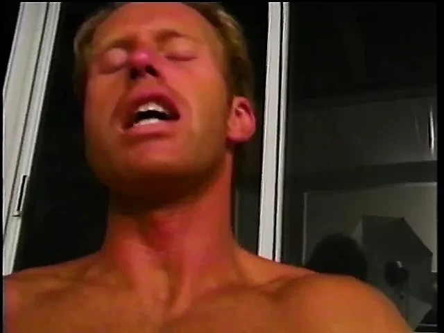 Guy with an amazing body nails young stud's ass on the sofa