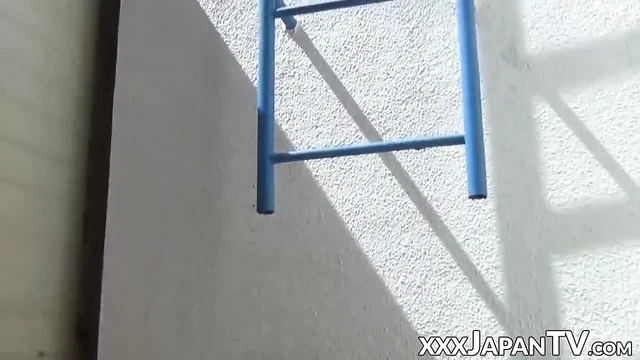 Japanese schoolgirl playing with herself in broad daylight