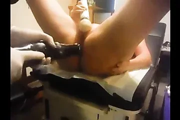 Anal torture in gyno chair