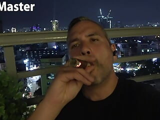 Uncut daddy smokes cigar and jerks on balcony PREVIEW