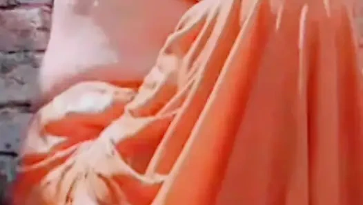 While bathing, the village woman is taking a bath naked after taking off her clothes completely