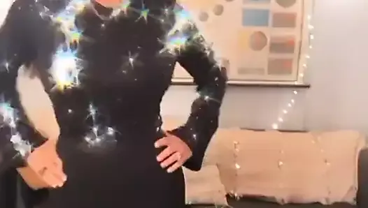 Salma Hayek dancing in shiny outfit