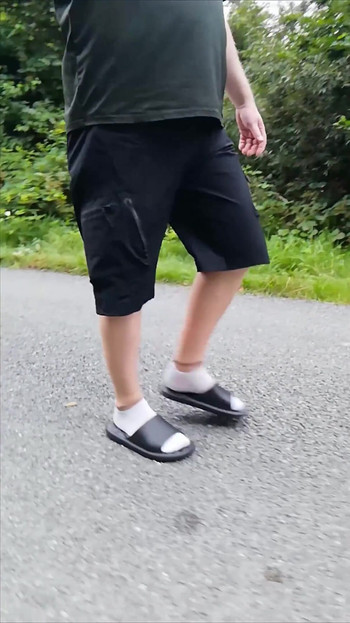 In Slippers and White Socks in Nature