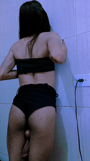 Naughty girl loves to masturbate in a bikini. Effeminate gay man in women's clothes showing his ass