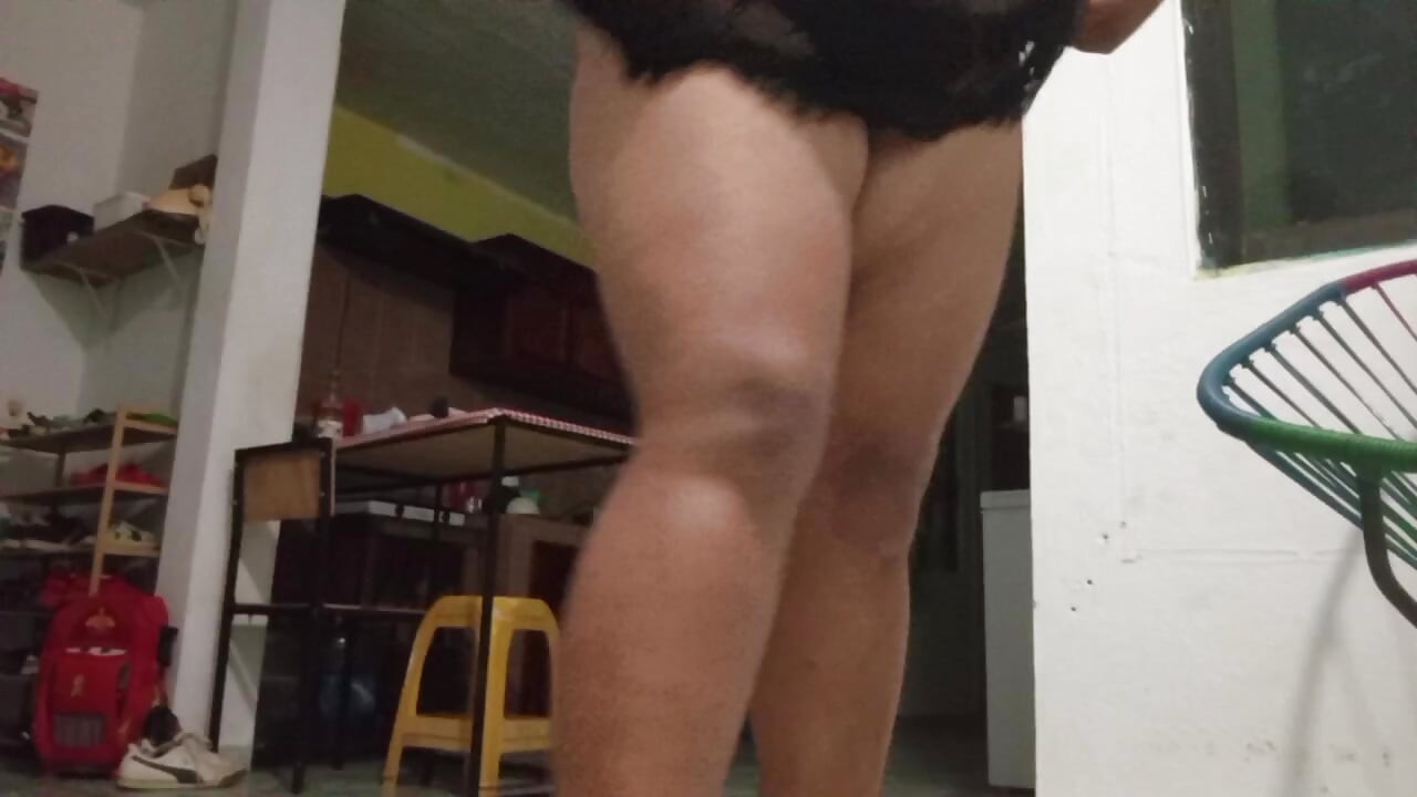 Chubby Mexican milf shows ass and tits in the kitchen