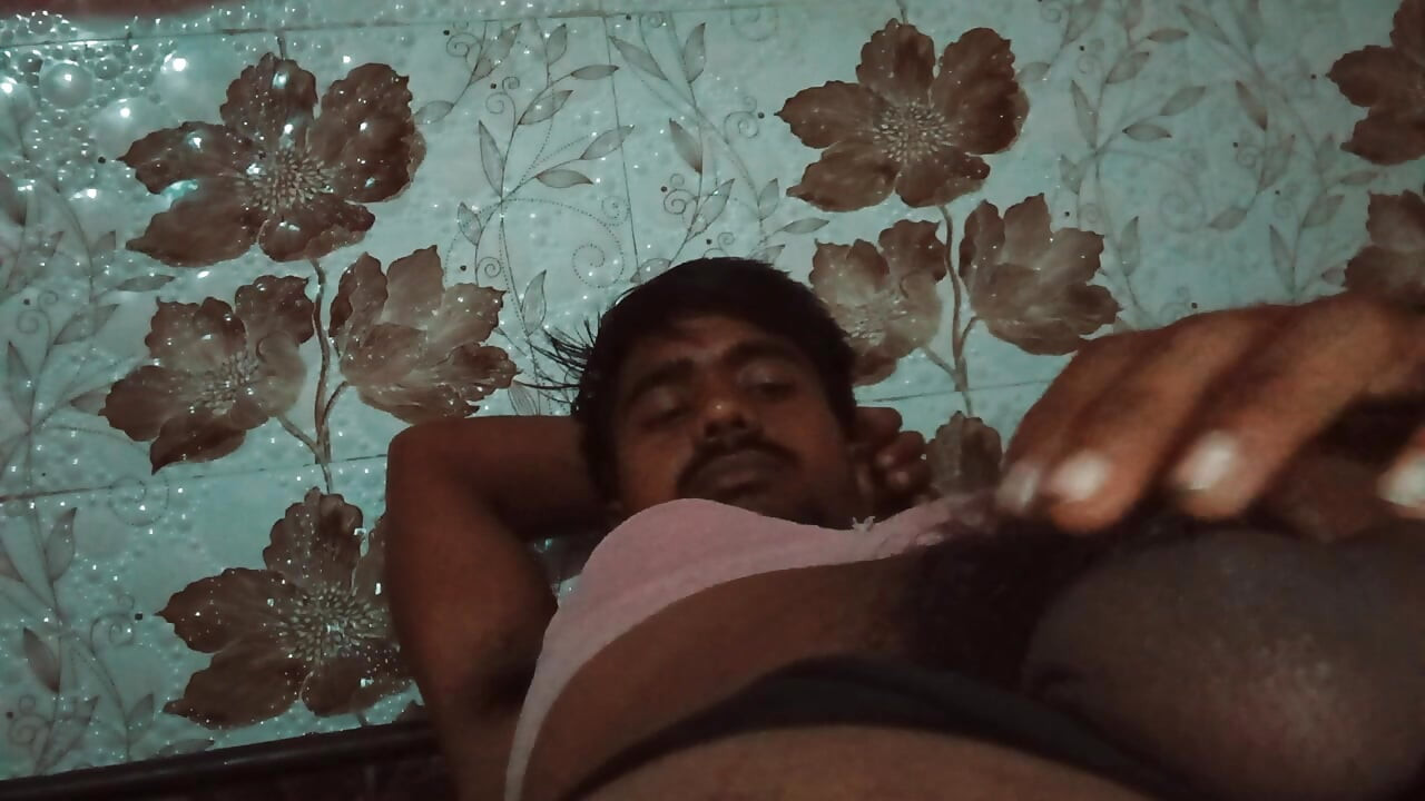 Massage of a big penis with black hair