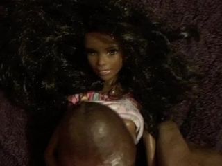barbie doll lifts up her dress for cum