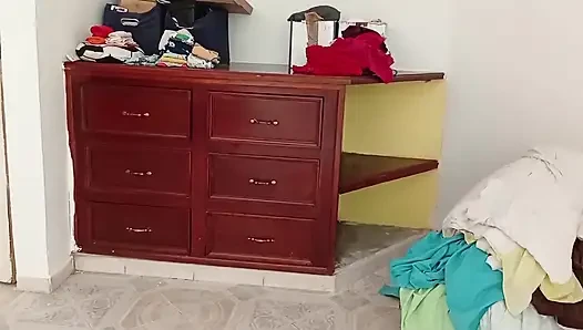 Chubby Girl Tidying the Room and Folding Clothes