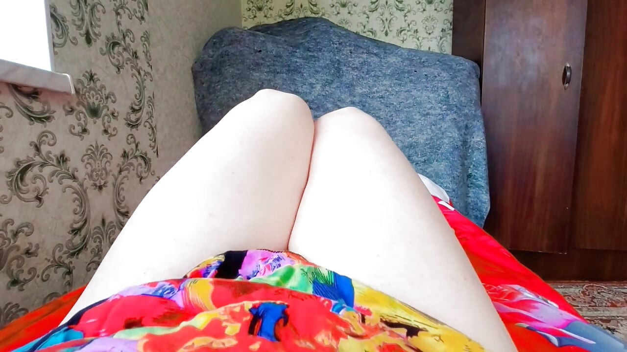 Gorgeous trans beauty gazing into mirror with smile