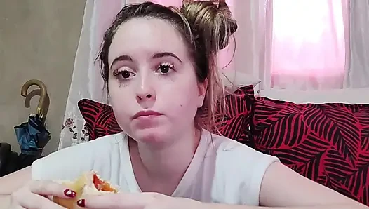 Eating an omelette sandwich with cherry tomatoes