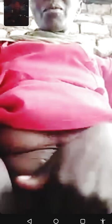 Hadzabe Tribe Mature Woman on Video Call with BF, Don't Ask Me Where She Got the Phone.