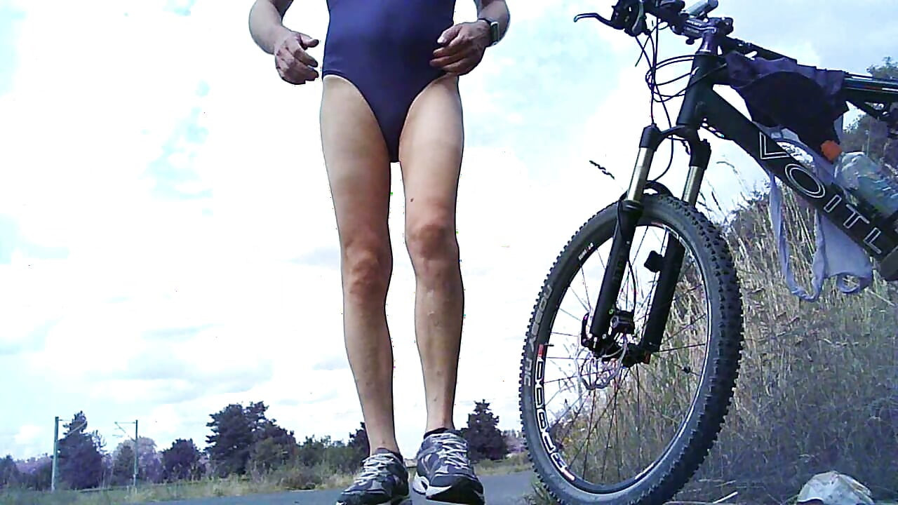 In a swimsuit on the bike