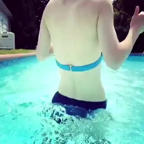 Alexandra Daddario in a pool - August 2018