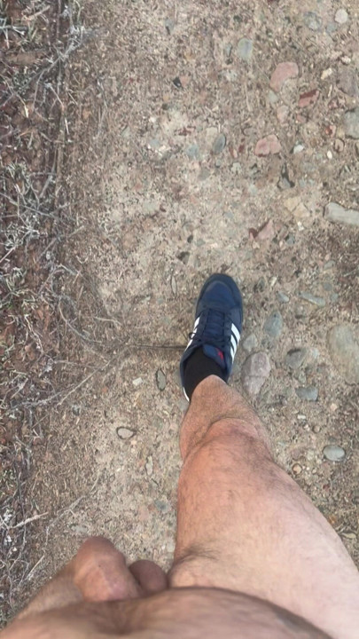 Little nude winter walk past a farm house