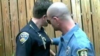 Two crazy cops perfect their cocksucking skills