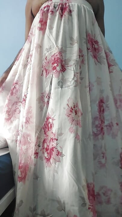 I'm masterbating in a flowery flowing silky seethrough fleard skirt and cum