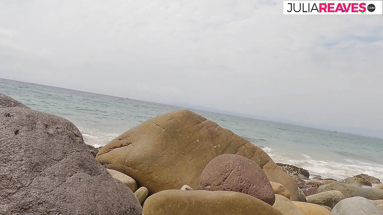 Horny girl sucks a huge cock on the rocks to a cumshot