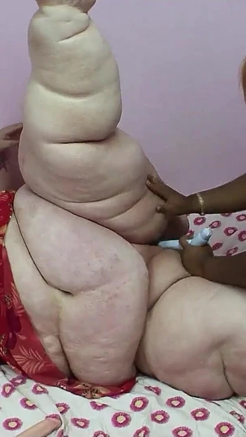 Captivating moment from "Extremely fat black and white women at rare Lesbian Sex"