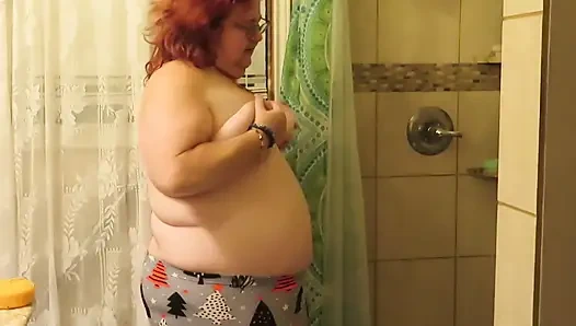 Step mom cleaning bathroom thinks of her step son watching