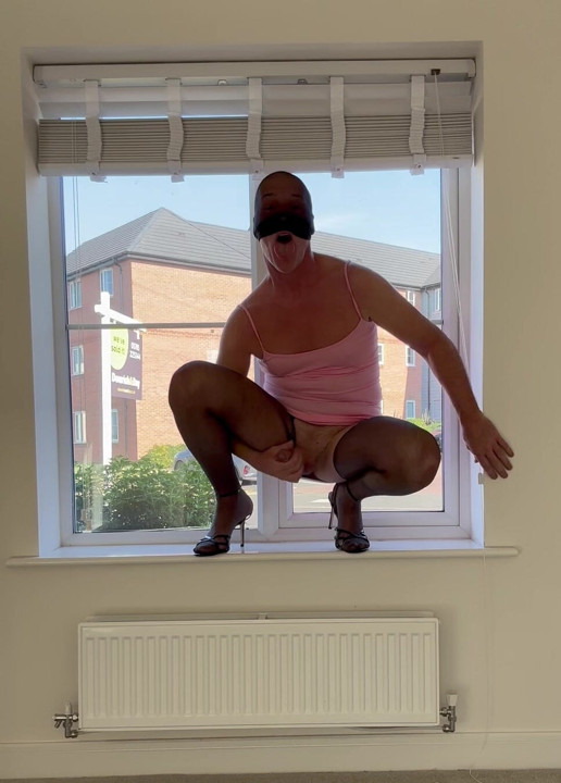 Slut fag sissy wanking in the window