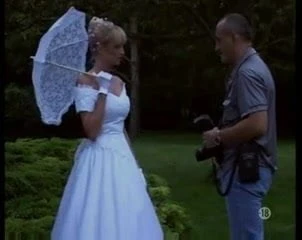 The bride in stockings outdoor
