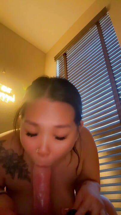 asian mistress gives sloppy dildo blowjob while girlfriend is at work