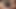 革を着たブロンドの美女がディルドで自分を快楽にする