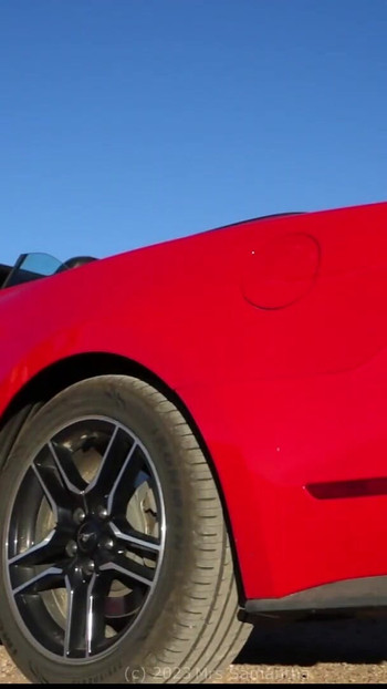Epic moment from "Desert Mustang Lady Playing, Mrs Samantha and her Red Mustang"