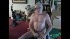 mature step dad with glasses empties his balls