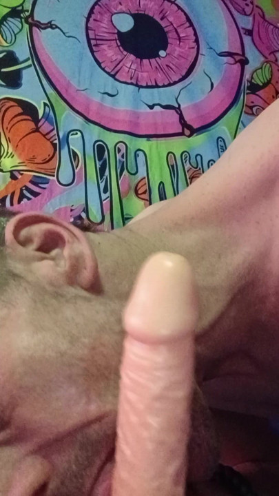 Sucking on my big dildo