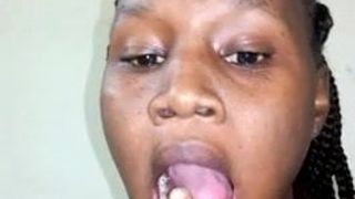 African girlfriend licking her finger