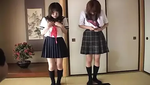 Two naughty school girls having fun